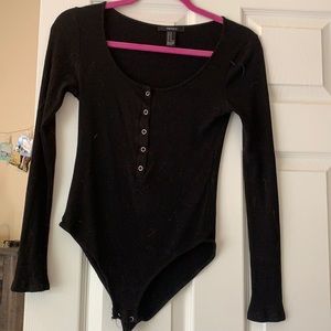 Flattering body suite.